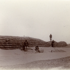 Old sepia photograph of the Survey of India in the field